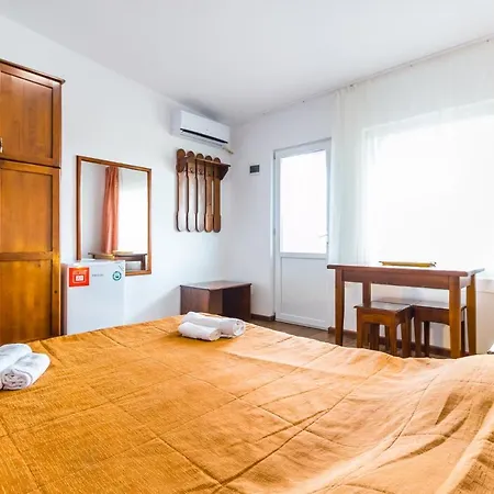 Gazde/Camere de închiriat Casa Luca 2